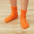 Oranžinės pūkuotos šiltos kojinytės