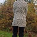 Pilkas pyniuotas megztinis