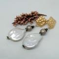 Puošnūs auskarai su gėlavandeniais perlais